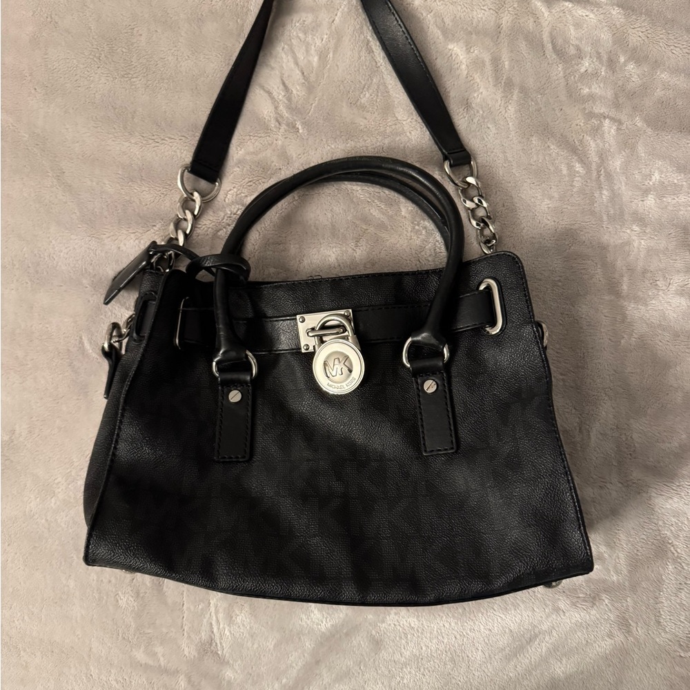 Chic Black Michael Kors Satchel with Silver Accents